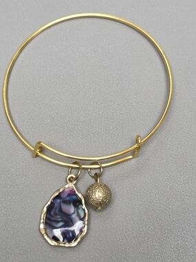 Gold-Tone Bangle Bracelet with Iridescent Abalone Charm